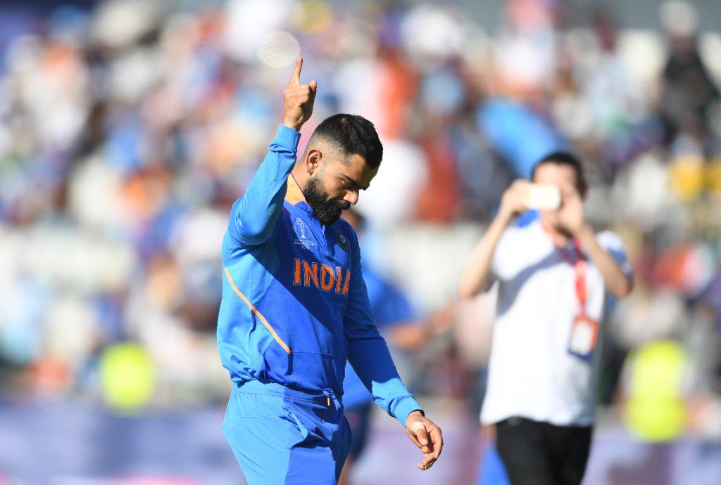 Virat Kohli celebrates victory against West Indies in the World Cup.